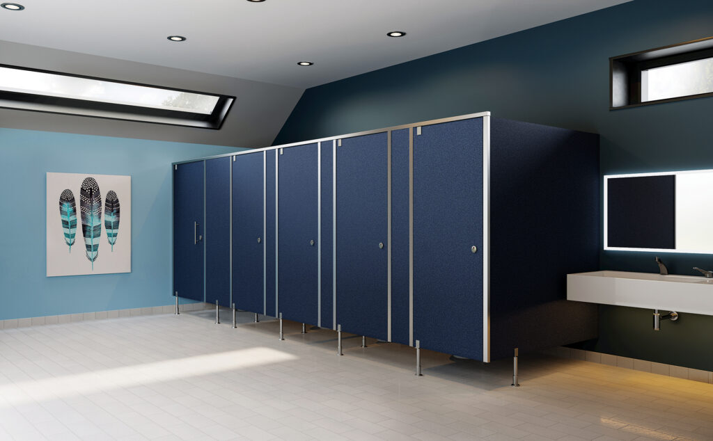 Blue European-style Evolve Cubicles provide privacy in a large washroom.